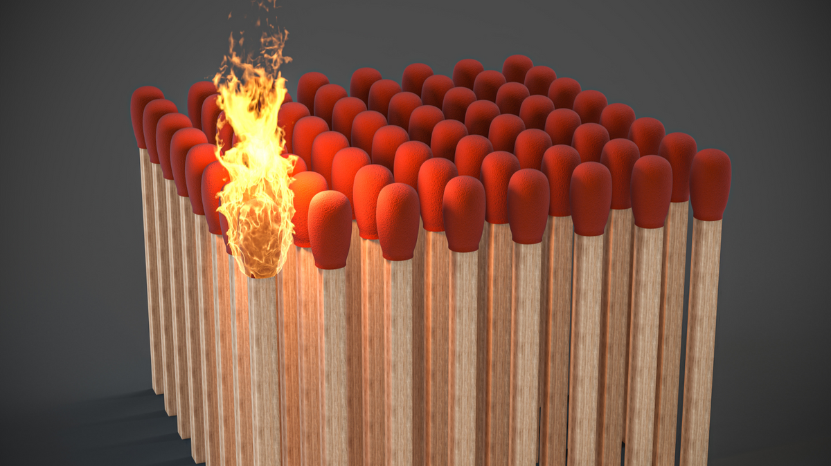 Burning match demonstrating flammability