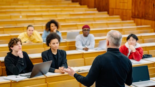 Engineering students in university lecture hall preparing for exam