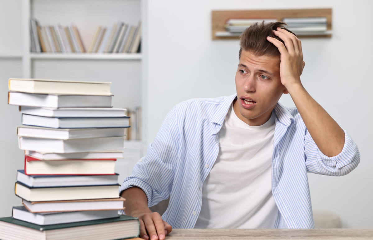 PMP exam candidate reviewing study materials