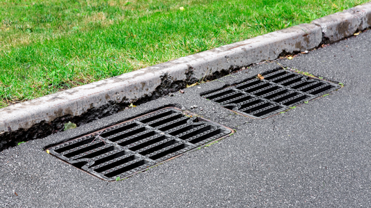 Residential storm drain along curb