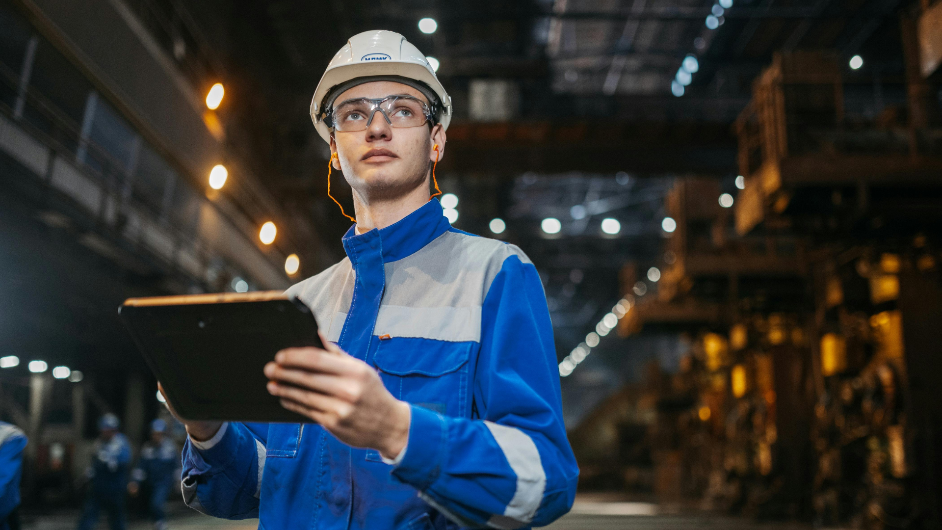 Transportation engineer inspecting industrial infrastructure