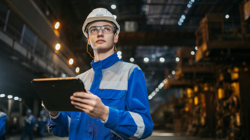 Transportation engineer inspecting industrial infrastructure